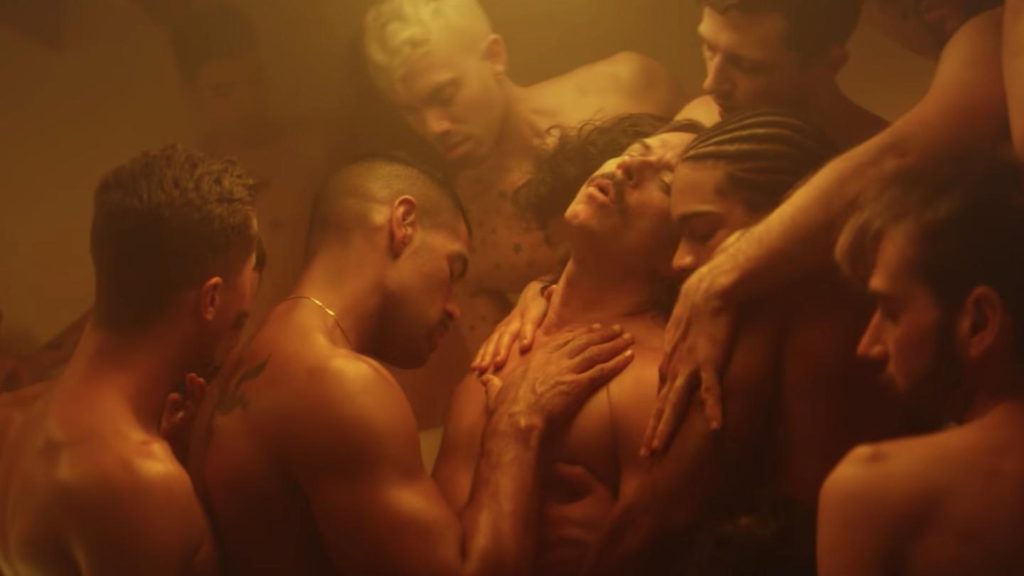 Casey Spooner surrounded by hot sweaty men gives him something to sing about