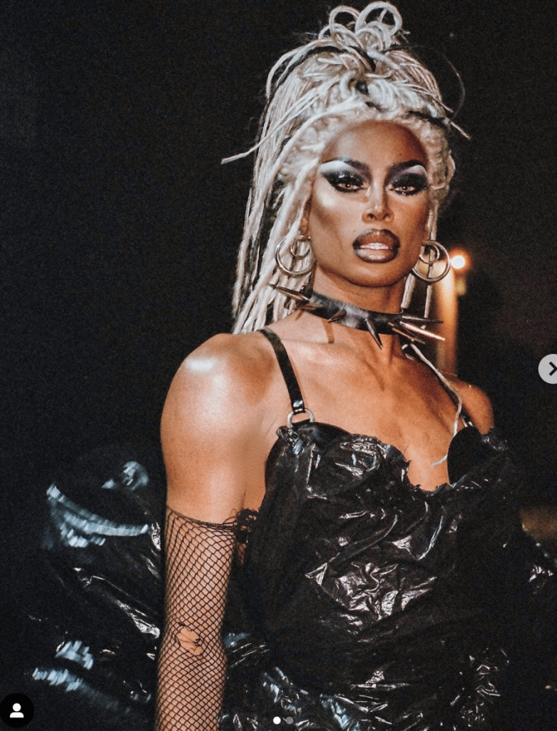 Joseph Wilson films Tayce amongst the trash