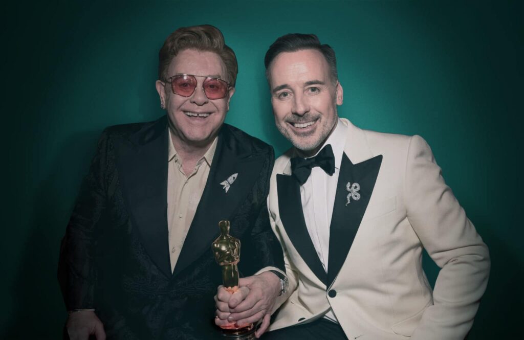 Sir Elton John invites you to party & celebrate The Oscars with him